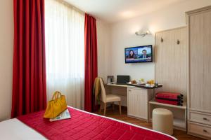 TV o dispositivi per l'intrattenimento presso Simon Hotel