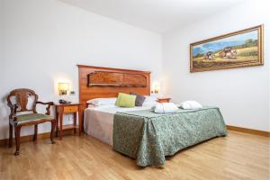 Posteľ alebo postele v izbe v ubytovaní Colleverde Park Hotel