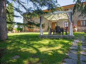 a gazebo in the yard of a house at Apartment Giglio by Interhome in San Baronto