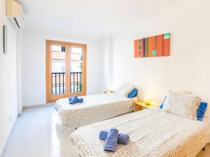 A bed or beds in a room at Apartment Mariners 2 by Interhome