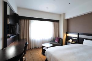 Letto o letti in una camera di Hotel Granvia Hiroshima