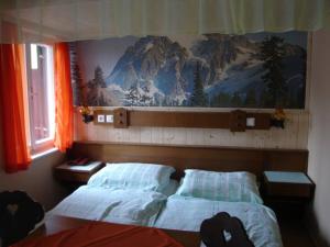 Postel nebo postele na pokoji v ubytování Hirscheggerhof