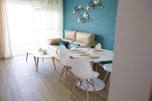 a living room with two tables and a couch at Apartamento Navajas MRZ Rentals in Barbate