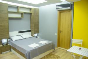 Postel nebo postele na pokoji v ubytování Batumi Hotel R&M