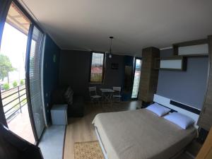 Postel nebo postele na pokoji v ubytování Batumi Hotel R&M