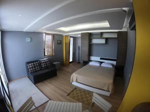 Postel nebo postele na pokoji v ubytování Batumi Hotel R&M
