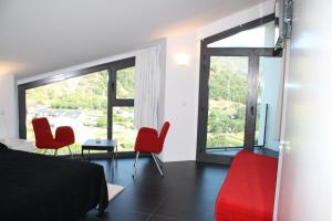 Posezení v ubytování Hostal Tres Campanas