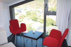 Posezení v ubytování Hostal Tres Campanas