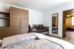 Łóżko lub łóżka w pokoju w obiekcie Chalet Sofie