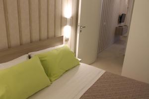 Säng eller sängar i ett rum på Soffio del mare