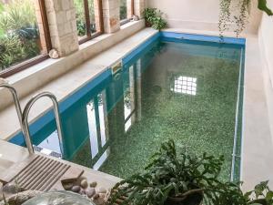 The swimming pool at or close to Iconic Cretan Stone Mansion