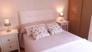 Кровать или кровати в номере Sanxenxo Apartamento
