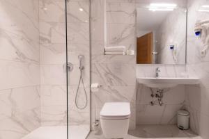 Koupelna v ubytování Hotel Nova