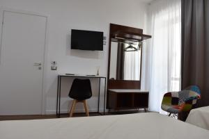 TV a/nebo společenská místnost v ubytování b&b Donna Raffaela