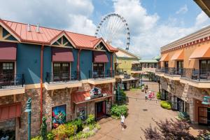 an amusement park with a ferris wheel in the background at Margaritaville Island Hotel in Pigeon Forge