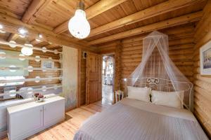 Кровать или кровати в номере Lakkia - Wooden Residence