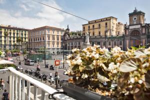 a view of a city with buildings and a street at Citykey Napoli - Bed & Breakfast in Naples