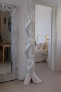 Кровать или кровати в номере Astarte Luxury Apartments