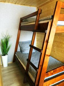 Łóżko lub łóżka w pokoju w obiekcie Aurora Ustka-Przewłoka