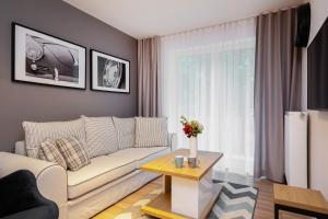 Χώρος καθιστικού στο Apartments Parks of Warsaw by Noclegi Renters +31 φωτογραφίες