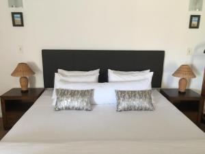 Letto o letti in una camera di Vue Port