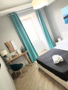 Postel nebo postele na pokoji v ubytování Solfatara Suites B&B