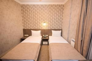 Old Garden Hotel Batumi客房内的一张或多张床位