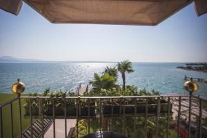a view of the ocean from a balcony at Grand Hotel Terme Sirmione in Sirmione