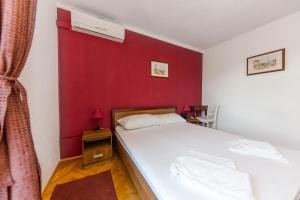Posteľ alebo postele v izbe v ubytovaní Seaside Villa Mia Trogir