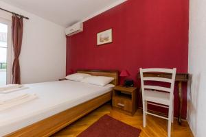 Posteľ alebo postele v izbe v ubytovaní Seaside Villa Mia Trogir