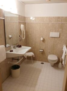 Koupelna v ubytování Hotel Bassetto