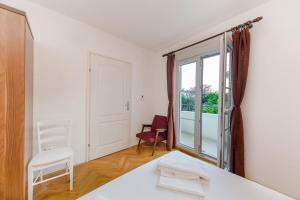 Posteľ alebo postele v izbe v ubytovaní Seaside Villa Mia Trogir