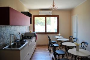 Kuchyňa alebo kuchynka v ubytovaní Puteoli house