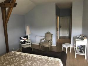 Postel nebo postele na pokoji v ubytování Chambres d'Hotes du Moulin de Lachaux