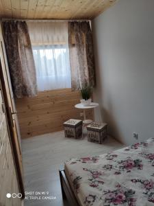 Łóżko lub łóżka w pokoju w obiekcie Aurora Ustka-Przewłoka