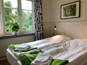 Voodi või voodid majutusasutuse Pensionat Söderåsen toas
