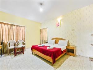 Postel nebo postele na pokoji v ubytování Rainbow Cottages-Budget Friendly rooms