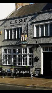 an old ship inn on the corner of a street at The Old Ship Inn in Dorchester