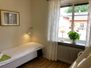 Voodi või voodid majutusasutuse Pensionat Söderåsen toas