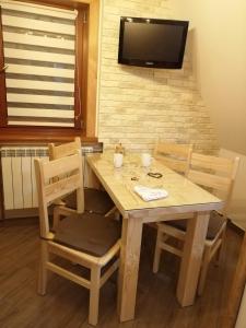 TV/trung tâm giải trí tại Apartamenty Folk Dream Harenda Zakopane