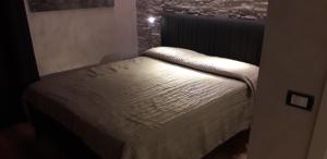Postel nebo postele na pokoji v ubytování A 2 PASSI da