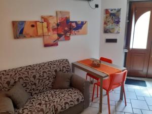 a living room with a couch and a table at Casa LuLù in Catanzaro