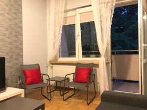 Posedenie v ubytovaní Rent0nline Hoża Apartment Center Metro