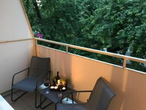 Balkón alebo terasa v ubytovaní Rent0nline Hoża Apartment Center Metro