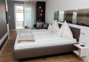 Postel nebo postele na pokoji v ubytování Hotel Freisicht