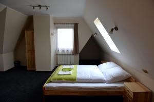 Posteľ alebo postele v izbe v ubytovaní Noclegi Sucha Woda