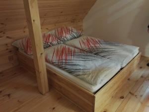Postel nebo postele na pokoji v ubytování Horská chata Plzeňka Pernink