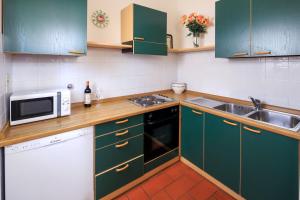Kuchyň nebo kuchyňský kout v ubytování Agriturismo Fattoria di Sommaia