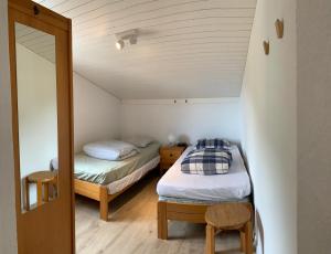 En eller flere senge i et værelse på Cucagna