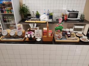 Kuchyň nebo kuchyňský kout v ubytování Napa Hostel Samrong Station